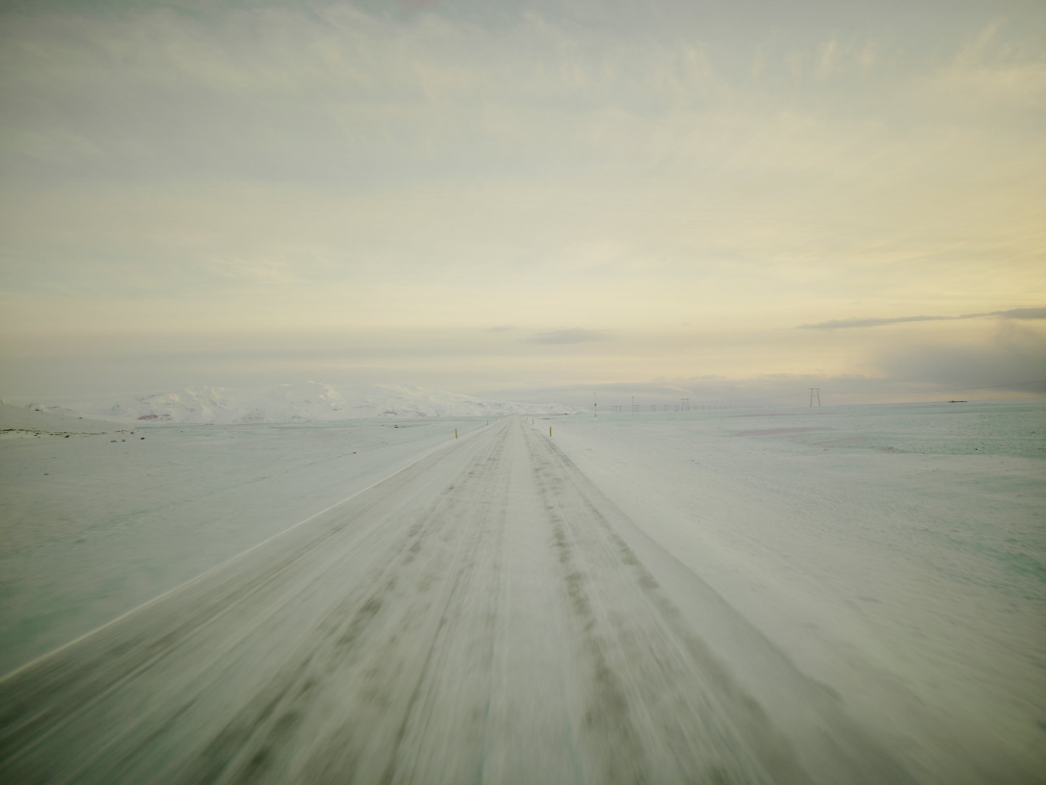 WHITE BOULEVARD by Frank Kayser — frozen Icelandic Ring Road in pale winter light