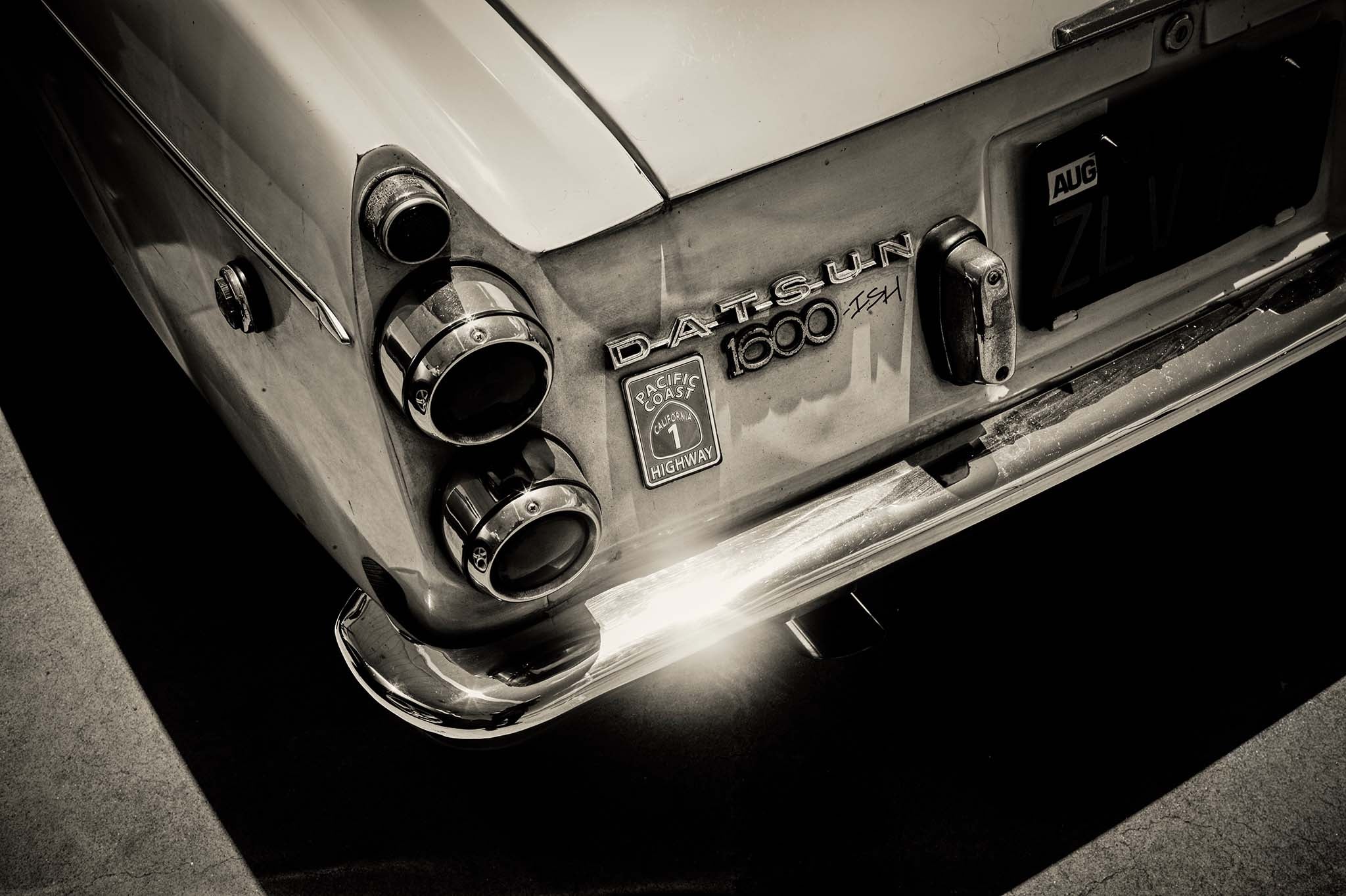 BLUE JEANS RIDE DATSUN fine art photograph by Frank Kayser showing working vehicle in a urban still life (Pacific Coast Highway – California)