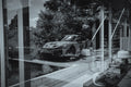 A Man’s World fine art photograph by Frank Kayser showing working vehicle in a urban still life (Richard Neutra Villa · Very Exclusive Porsche 935 Shooting)