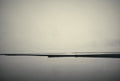 Nebellinie Eins fine art photograph by Frank Kayser showing coastal horizon in a minimal seascape (Nordic Coastline – Nordic Series)