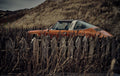 Blood Orange Sylt fine art photograph by Frank Kayser showing working vehicle in a urban still life