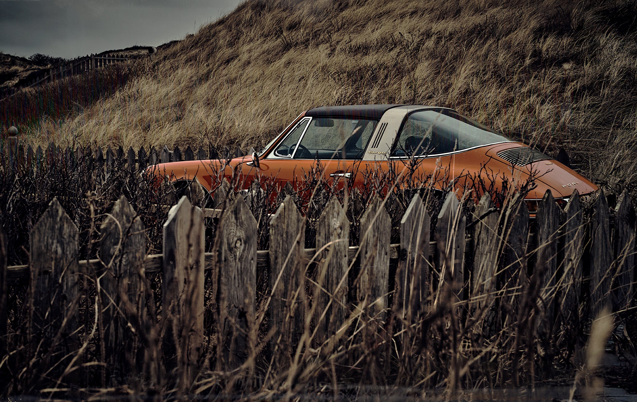 Blood Orange Sylt fine art photograph by Frank Kayser showing working vehicle in a urban still life