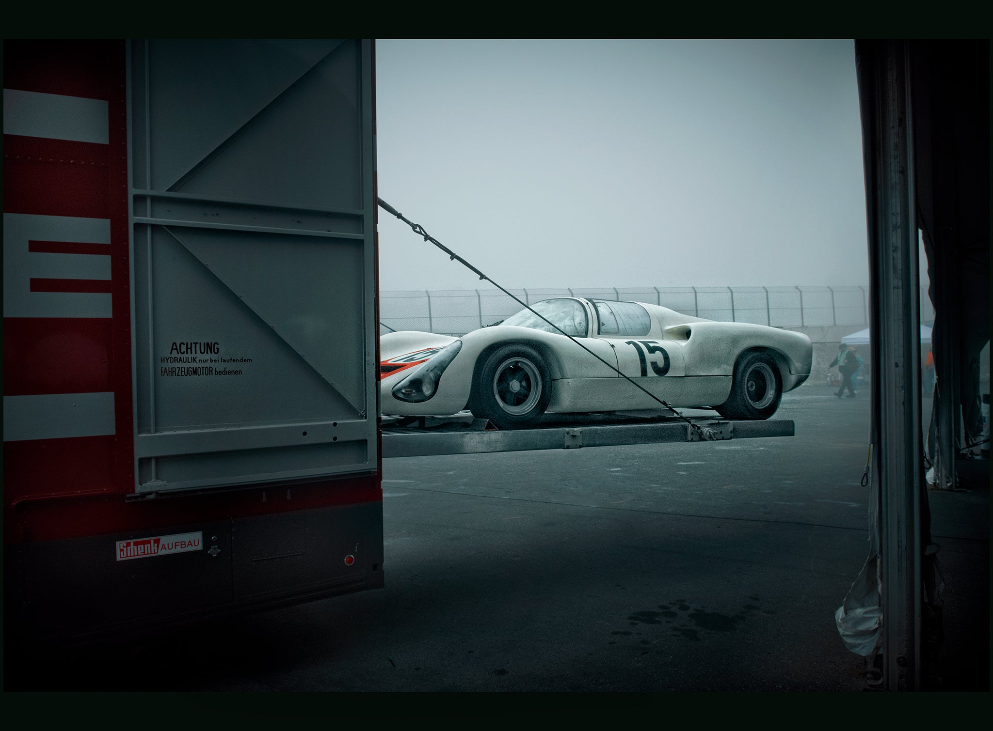 WHITE BOY · FOGGY ICONE fine art photograph by Frank Kayser showing working vehicle in a urban still life (Rennsport Reunion · Foggy Paddock · 2013)